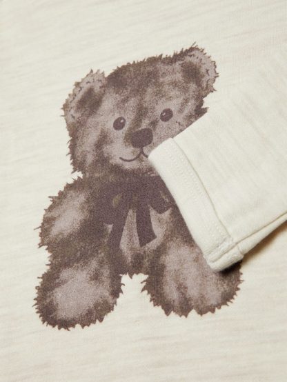 Beige ullbody til baby fra Name It