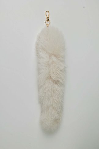 charm tail, cream white